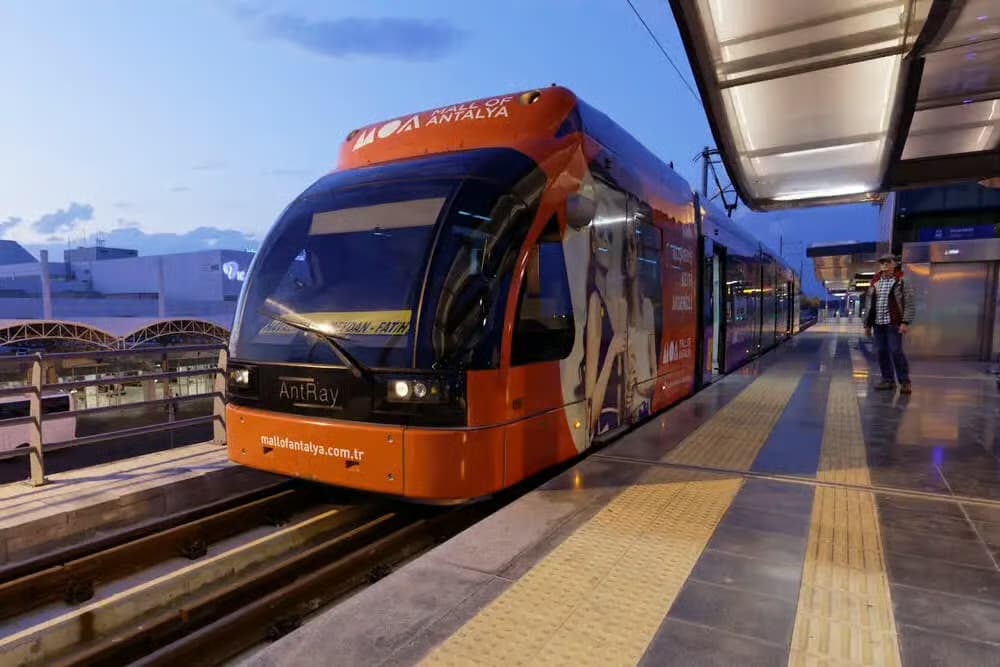 An AntRay tram waiting at a platform