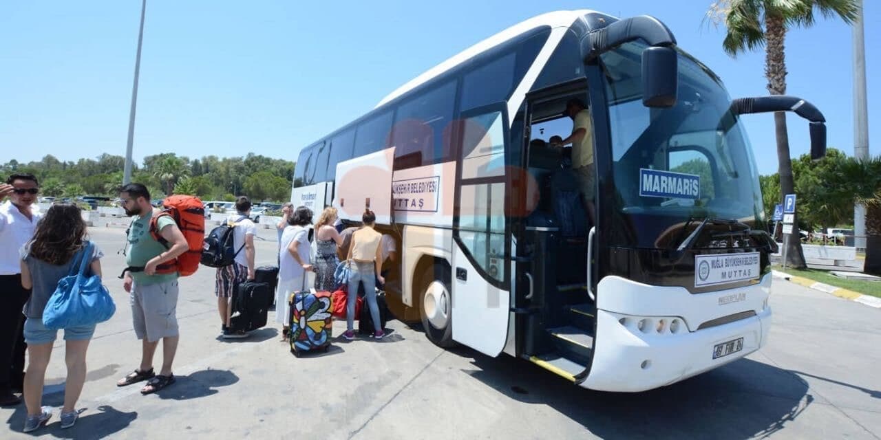 A MUTTAŞ coach to Marmaris boarding at Dalaman Airport